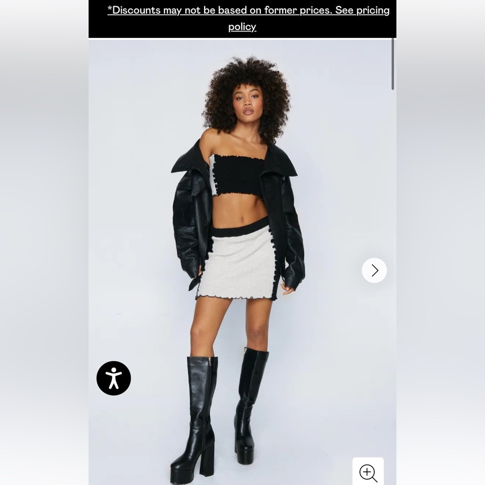 Exposed seam knitted mini skirt